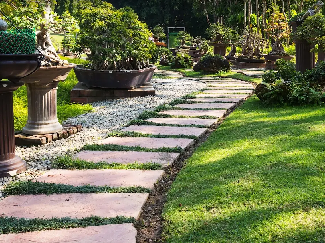 Flagstone stepping-stone path through a manicured garden